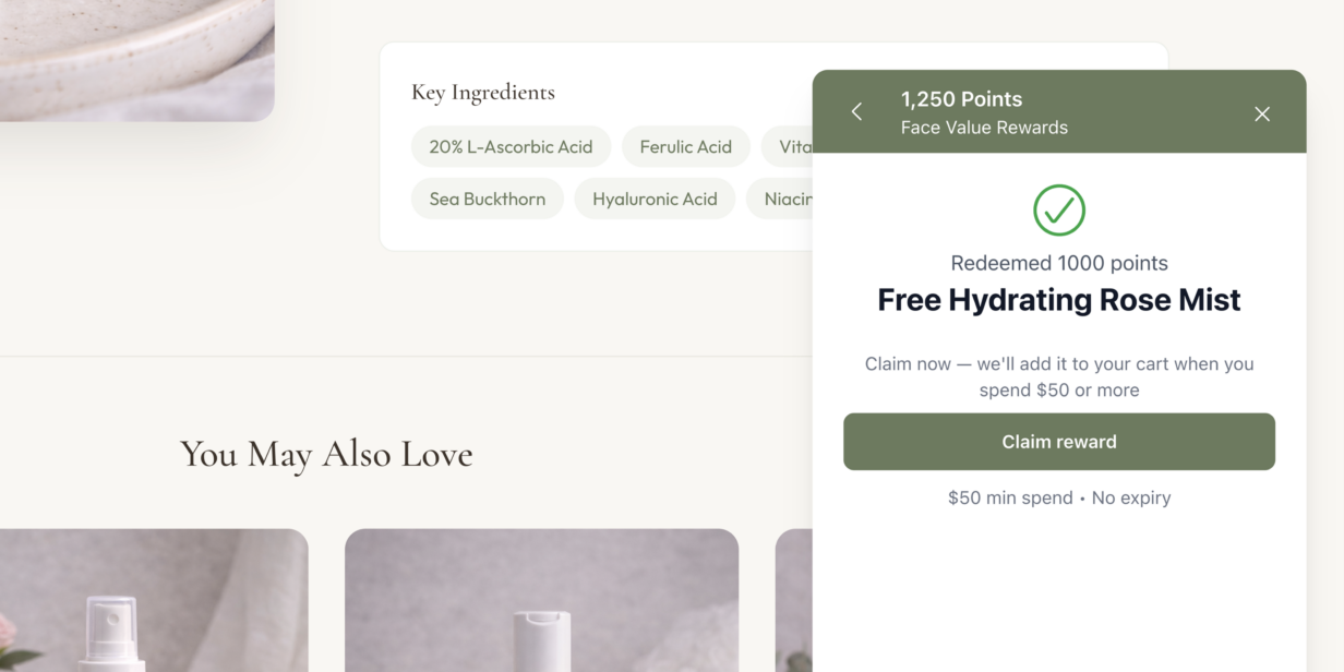 Widget del programa de fidelización de WooCommerce que muestra el botón de reclamar recompensa para un producto gratuito con requisito de gasto mínimo